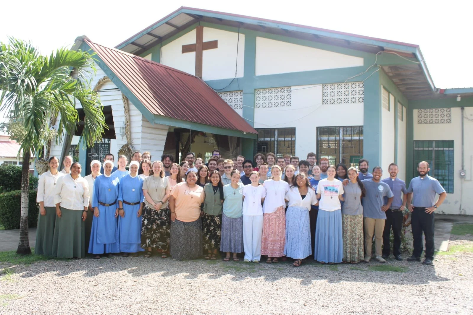 Newman students gathered together on mission
