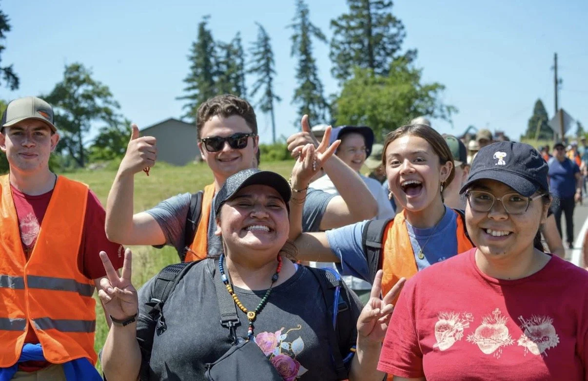 Friends smiling together on pilgrimage